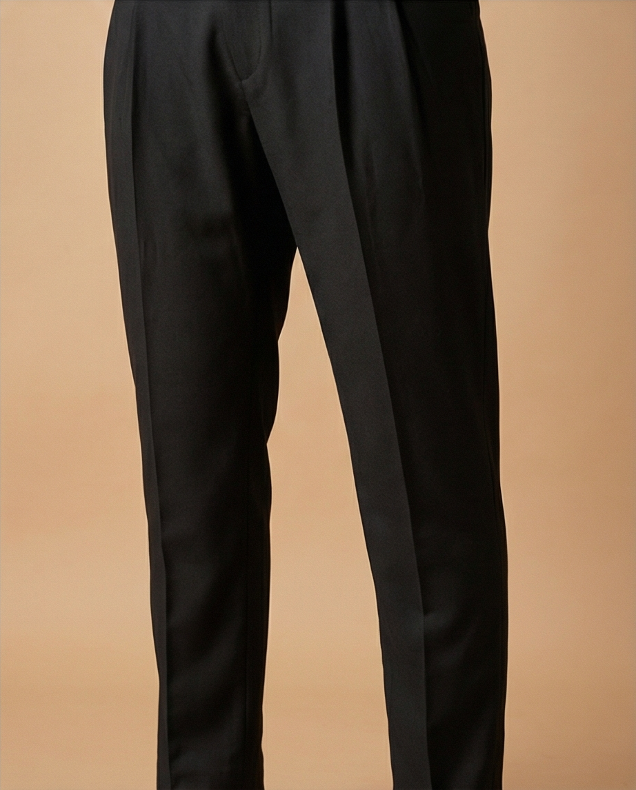 Black pants on a beige background